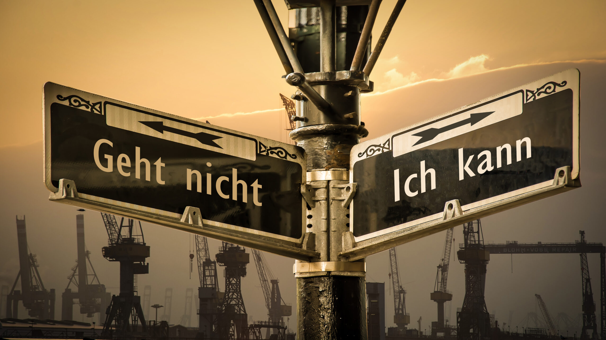 Wegweiser mit den Worten "kann ich" oder "kann ich nicht" als Beispiel für Kündigung als Chance und deren mögliche Vorteile.